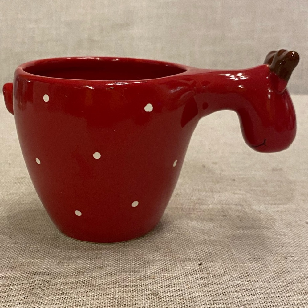 Red polka dot coffee mug moose head handle.